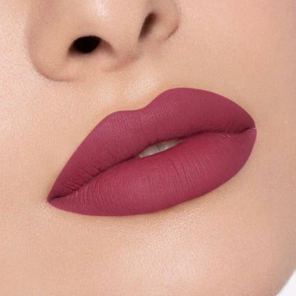 Close-up of a creamy, comfortable matte lipstick applied on lips in shade 04 Main Character